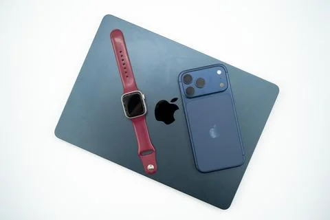 Apple ecosystem devices including iPhone MacBook and smartwatch. Toronto, Canada Stock Photos