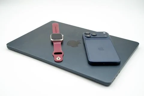 Apple ecosystem devices including iPhone MacBook and smartwatch. Toronto, Canada Stock Photos