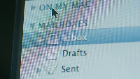 Apple Email client software mouse pointer over folders Stock Footage 99138301