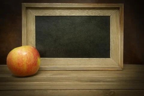 Apple with Empty Chalk Board Stock Photos