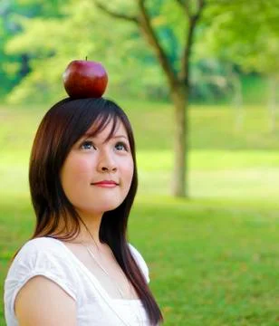 Apple fall on head Stock Photos