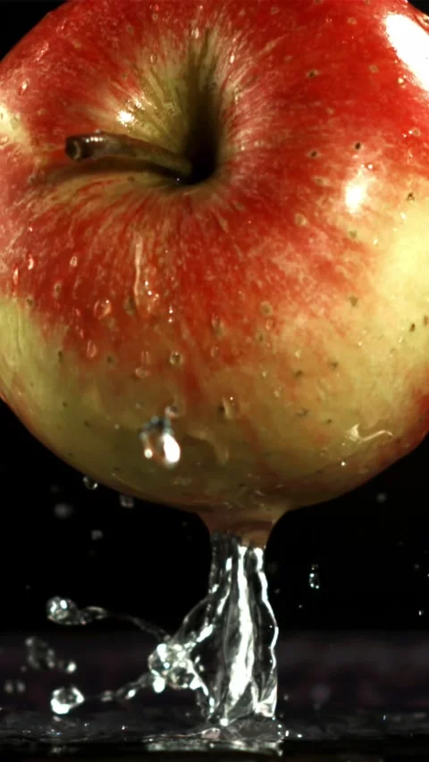 Apple fall on the table. Filmed is slow motion 1000 fps Stock Footage 335311438