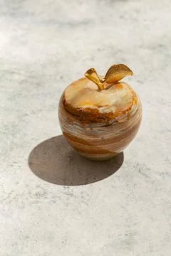 Apple figurine on a gray background Stock Photos