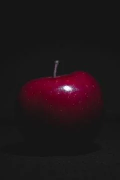Apple fruit, abstract shadow, black background Stock Photos