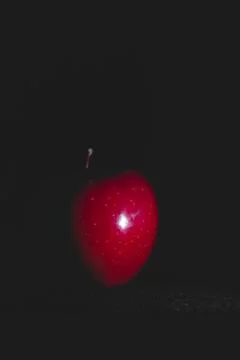 Apple fruit, abstract shadow, black background Stock Photos