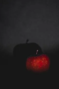Apple fruit, abstract shadow, black background Stock Photos