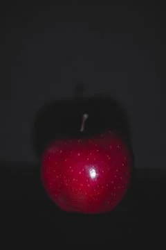 Apple fruit, abstract shadow, black background Stock Photos