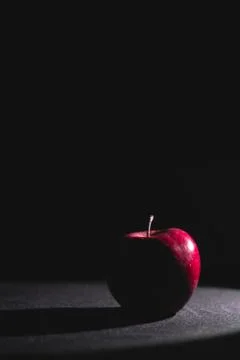 Apple fruit, abstract shadow, black background Stock Photos