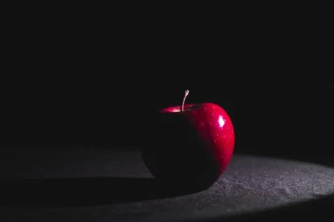 Apple fruit, abstract shadow, black background Stock Photos