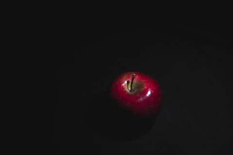 Apple fruit, abstract shadow, black background Stock Photos