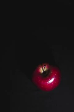 Apple fruit, abstract shadow, black background Stock Photos