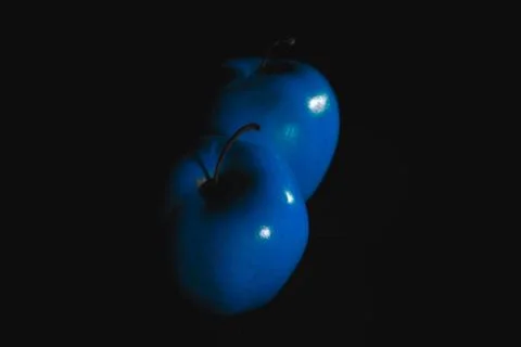 Apple fruit, abstract shadow, black background Stock Photos