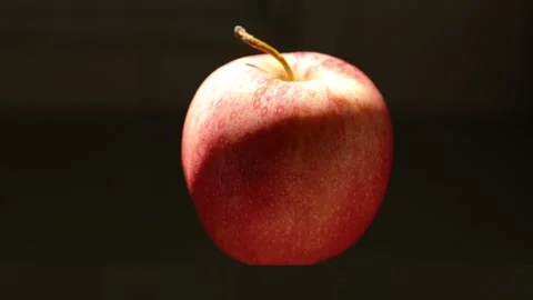 Apple fruit on black background Video stock 302536268