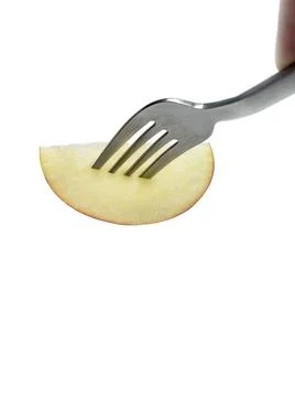 Apple fruit on fork isolated white background Foto stock