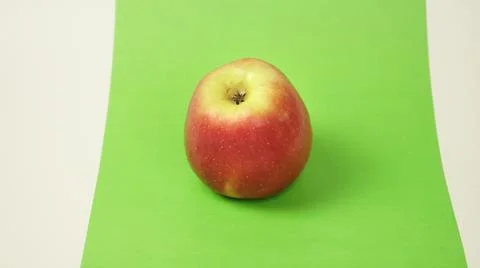 The apple fruit. A photo object in red placed on the green screen Stock Photos