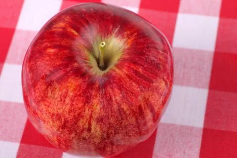 Apple on ginham Stock Photos
