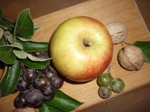 Apple grapes nuts Stock Photos