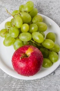 Apple with grapes Stock Photos