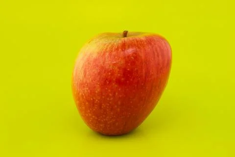 Apple on a green background Stock Photos