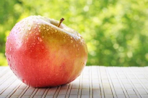 Apple on green background Stock Photos