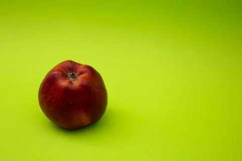 Apple on a green background Stock Photos