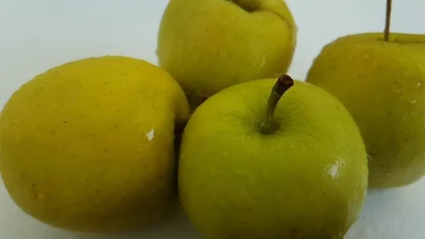 Apple green splashes on a white background slow motion Video stock 88352797