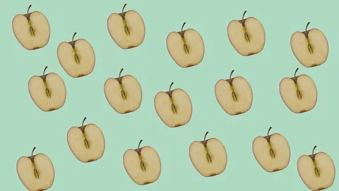 Apple Halves Dancing on Isolated Colored Background 库存影片 127117918