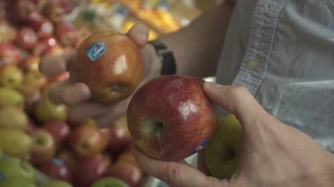 Apple in a Hand Stock Footage 260334301
