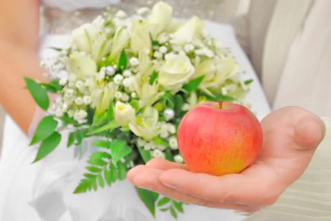 Apple in the hand Stock Photos