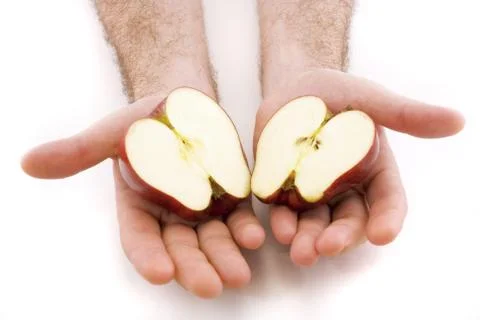 Apple in the hands isolated on white Stock Photos