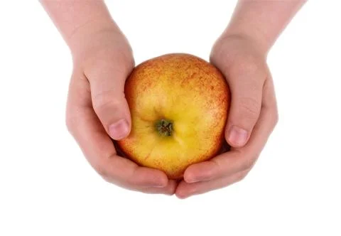 Apple in hands Stock Photos