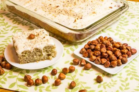 Apple hazelnut cake with nuts Stock Photos