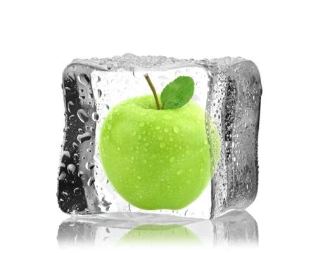 Apple in ice cube Stock Photos