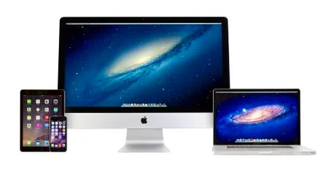Apple iMac 27, Macbook Pro,iPad Air 2 and iPhone 6 Stock Photos