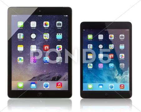 Apple ipad air and ipad mini displaying homescreen Stock Photos
