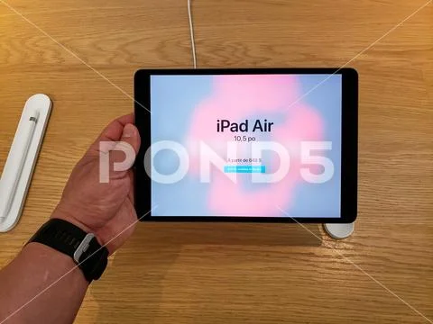 Apple iPad Air in a hand Stock Photos