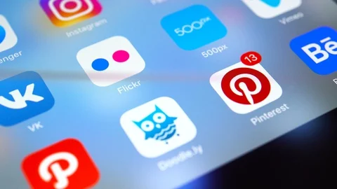 Apple iPad pro with icons of popular social media facebook, instagram, twitter Stock Footage