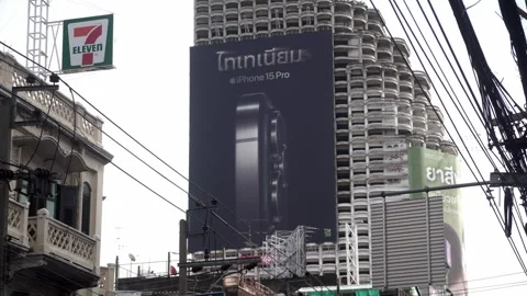 Apple iPhone 15 advertisement displayed on a building. Stock Footage 250417788