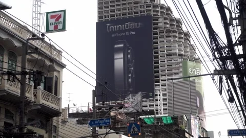 Apple iPhone 15 advertisement displayed on a building. Stock Footage 250417826