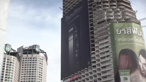 Apple iPhone 15 advertisement displayed on a building. Video stock 250418010