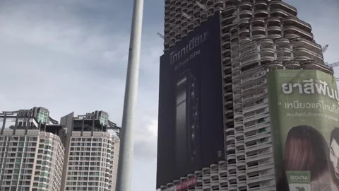 Apple iPhone 15 advertisement displayed on a building. Stock Footage 250418050