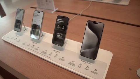 Apple iPhone 15 series smartphone is displayed at the Apple store. Video stock 252271952