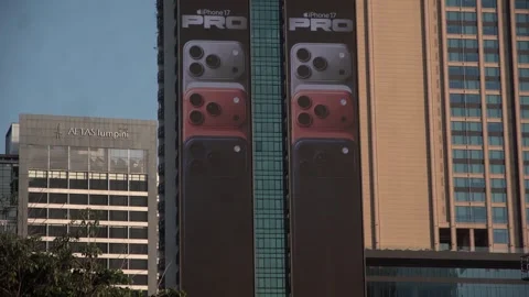 Apple iPhone 16 advertisement screen on a building in Bangkok, Thailand. Видео 342435605