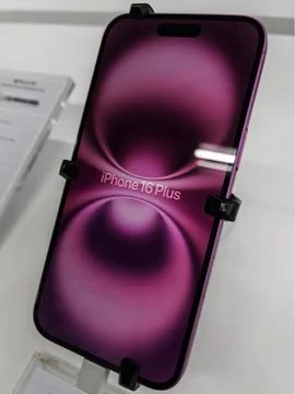 Apple iPhone 16 Plus Display in Purple Color Stock Photos