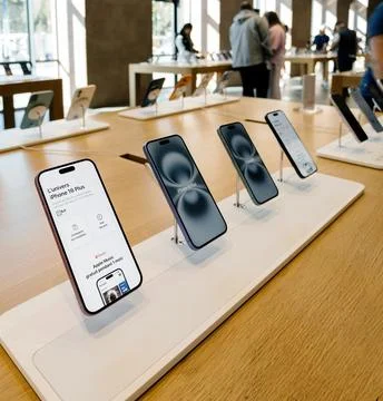 Apple iPhone 16 Plus Display in Apple Store Stock Photos