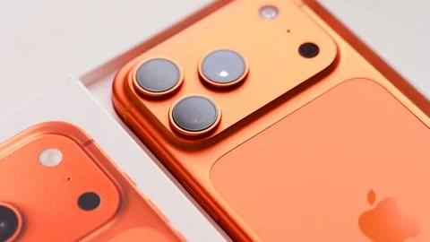 Apple iPhone 17 Pro smartphone in the cosmic orange color Stock Photos