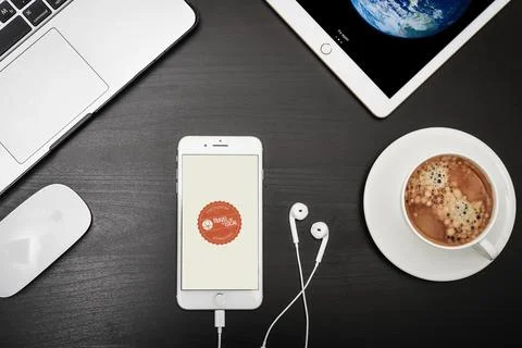 Apple iPhone 8 plus with Couchsurfing app on the screen Stock Photos