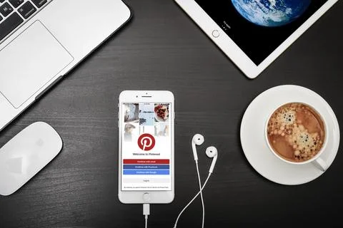 Apple iPhone 8 plus with Pinterest app on the screen Stock Photos