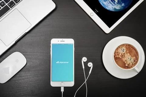 Apple iPhone 8 plus with Skyscanner app on the screen Stock Photos