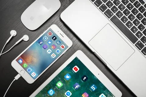 Apple iPhone 8 plus with social network apps on the screen Stock Photos